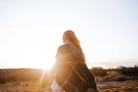 https://images.elijahlist.com/email_images/freephoto_woman_wrapped_in_blanket_300px_viaPexels.jpg